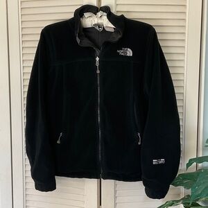 The North Face Women’s Black Full-Zip Jacket with Windwall technology.